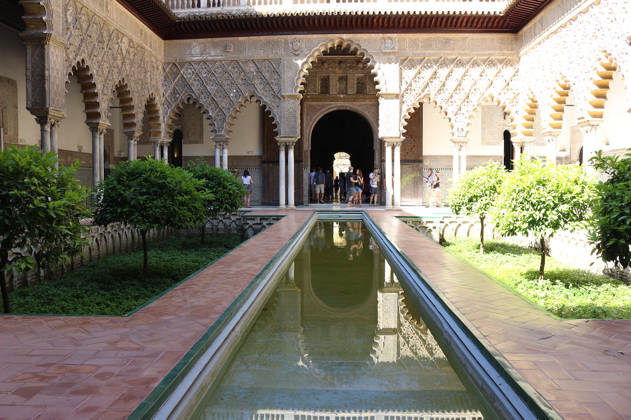 View of a long pool at Alhambra palace in Granada, Spain